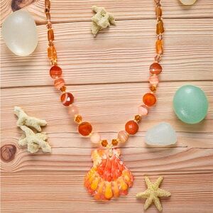 Elegant Orange Lions Paw Shell Beaded Necklace